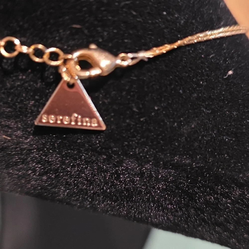 Gold Necklace with Blue Stone Accents